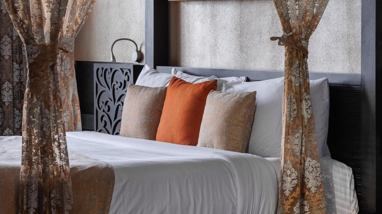 Hotel The Panoramic Getaway Munnar Exteriér fotografie A bed with cushions