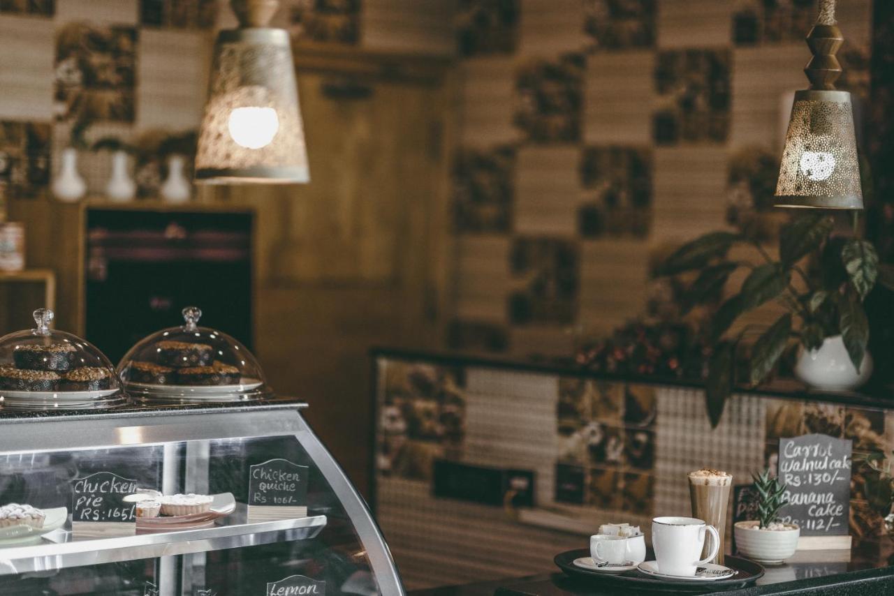 Hotel The Panoramic Getaway Munnar Exteriér fotografie Interior of a coffee shop
